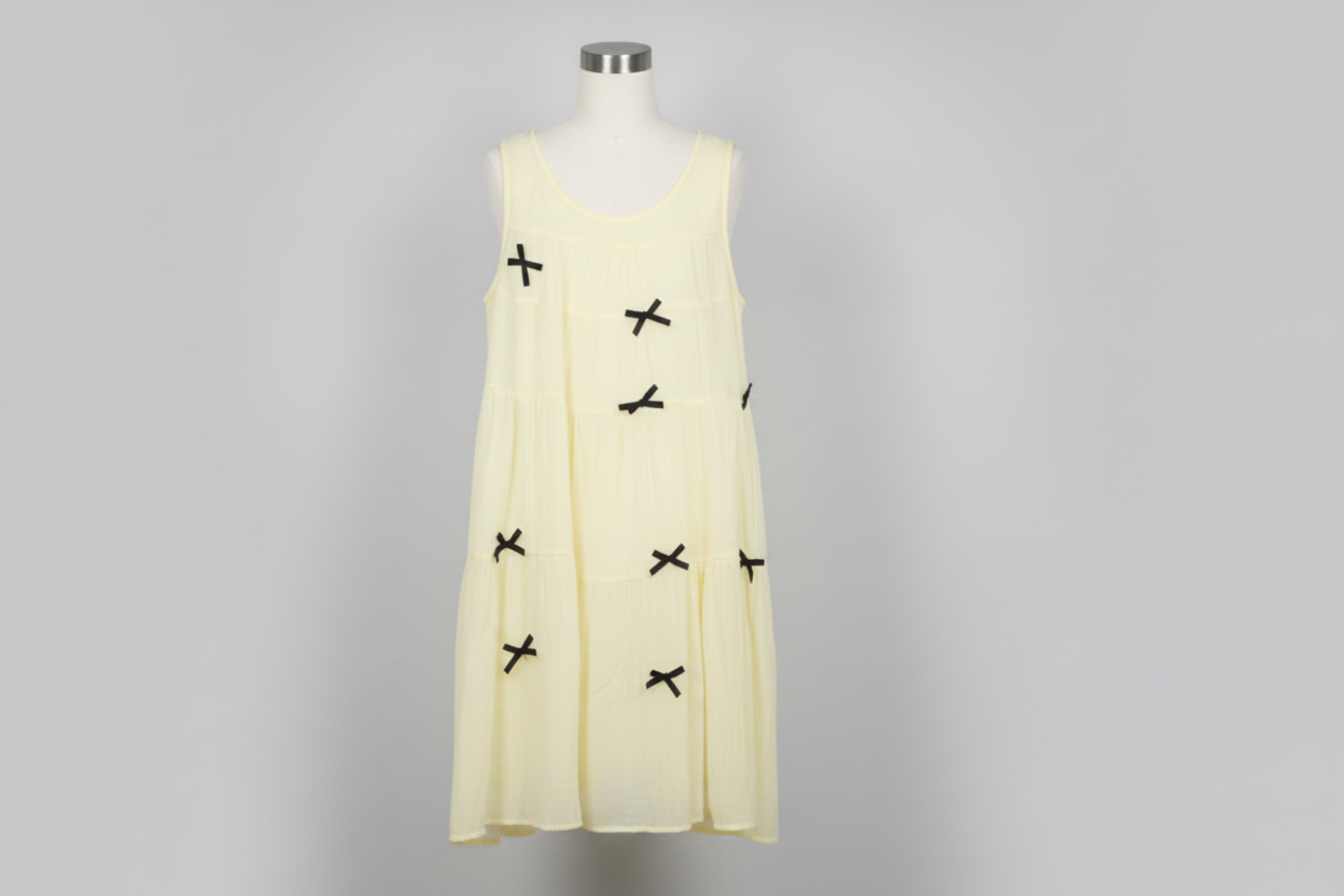 YELLOW DRESS WITH BLACK BOW