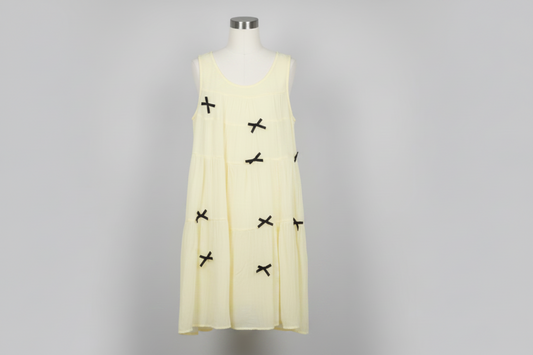 YELLOW DRESS WITH BLACK BOW